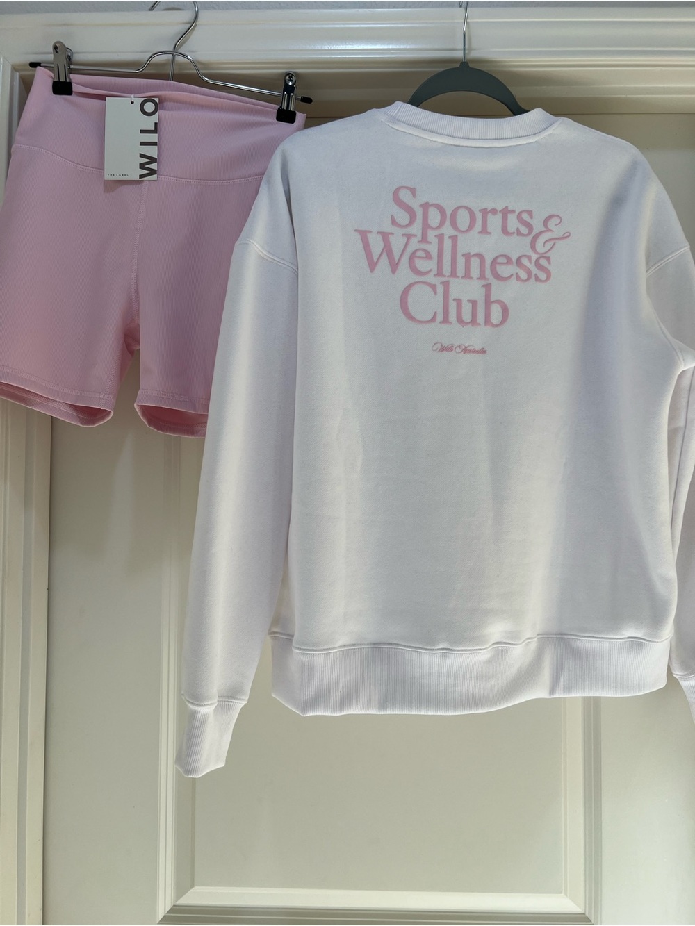 White Crewneck Sweatshirt with Pink Sports & Wellness Club Logo
